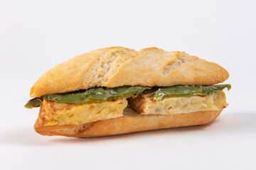 Spanish potato omelette sandwich with green peppers