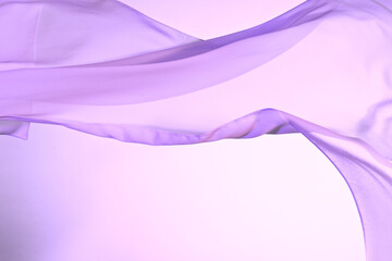 Smooth elegant colorful transparent cloth separated on white background. Texture of flying fabric.