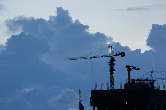 Construction crane on nice cloud, Construction site and beautiful sky.