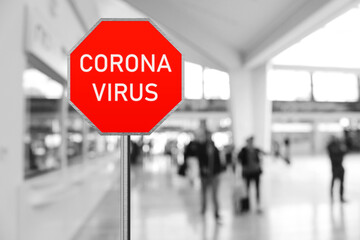 Stop coronavirus. Coronavirus stop sign at the airport. Travel restrictions
