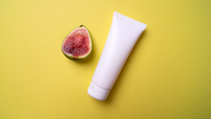 packaging of hand or face cream on yellow background