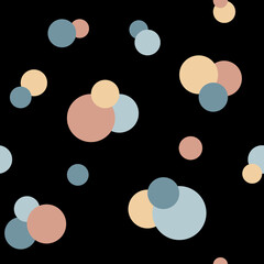 Colorful simple geometric seamless pattern with blue, pink and yellow circles. Muted colors on a black background. For textiles, packaging.