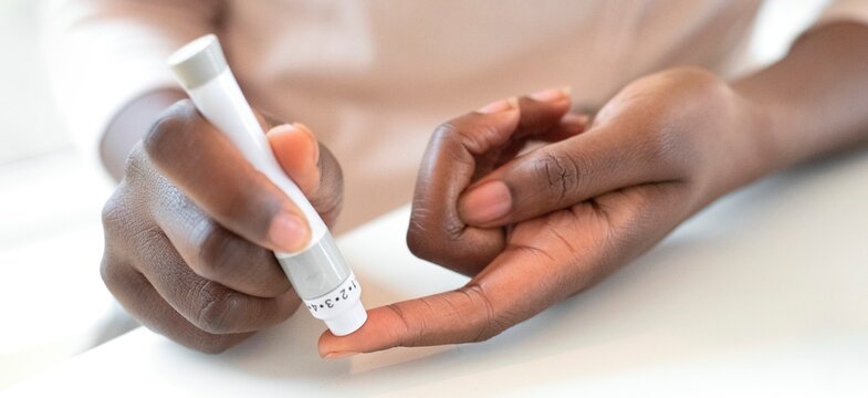Taking finger prick blood sample