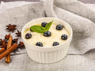 Tasty dairy porrige with berries