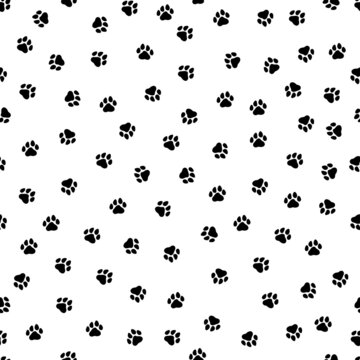 Seamless pattern with cat or dog paws. Cute and childish design for fabric, textile, wallpaper, bedding, swaddles, toys or gender-neutral apparel. Simple and sweet print for nursery decor or wall art.