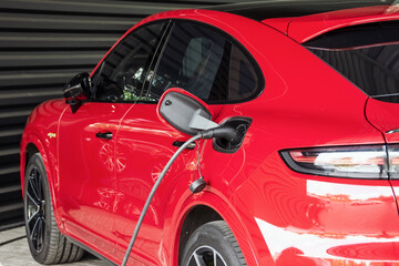 Fototapeta na wymiar Power supply for hybrid electric car charging battery.