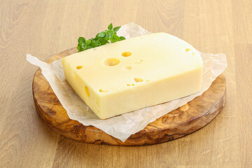 Maasdam cheese over the board