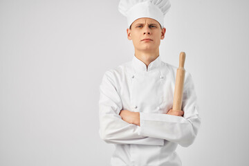 man chef rolling pin in hands emotions self-confidence kitchen