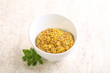 Grain mustard sauce in the bowl