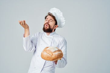male cook with bread in hand culinary industry