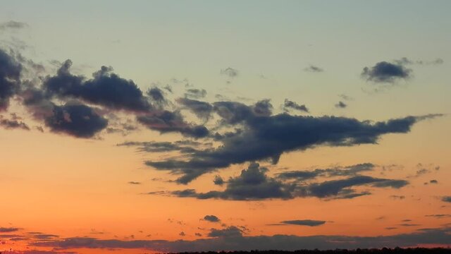 evening clouds move across the sky