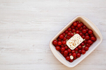 Homemade Baked Feta Tomato Pasta in a baking dish, top view. Overhead view, from above, flat lay. Copy space.