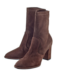 Beautiful pair of classic demi-season high-heeled boots made of brown suede, isolated on a white background.