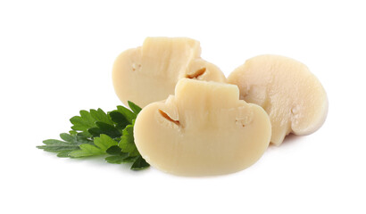 Cut marinated mushrooms and parsley isolated on white