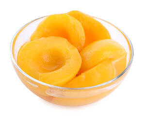 Halves of canned peaches in bowl isolated on white