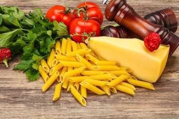 Raw penne rigate for cooking