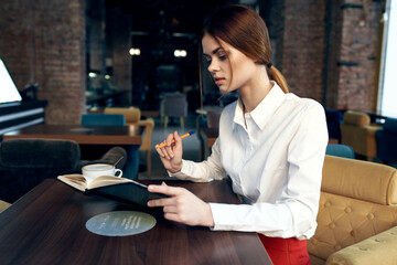 business woman sitting in a cafe work communication lifestyle
