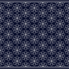 Flowers pattern in Geometric ethnic texture embroidery with Dark Blue background, wallpaper,skirt,carpet,wallpaper,clothing,wrapping,Batik,fabric,sheet, texture of Vector, illustration style.eps