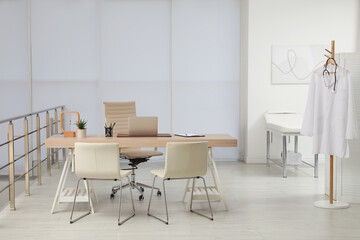 Modern medical office interior with doctor's workplace