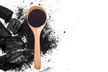 charcoal and charcoal powder on wooden spoon. Skin care,Health care,body wash gel beauty concept.Isolate on White background with clipping mask path. Above top view. - obrazy, fototapety, plakaty