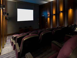 Mini movie theater with red seats and multiplex without people.