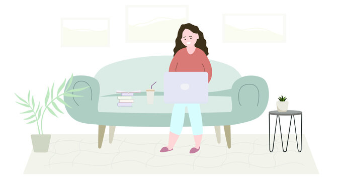 A woman with a laptop is sitting on a sofa. Home interior.