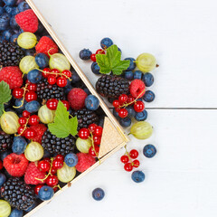 Fototapeta na wymiar Berries fruits berry fruit strawberries strawberry blueberries blueberry with copyspace copy space square in a box