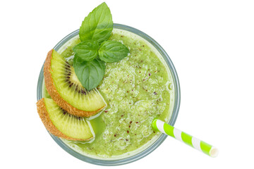 Green smoothie fruit juice drink kiwi in a glass isolated on white from above