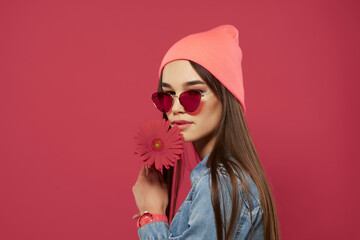 gorgeous brunette in pink hat red flower luxury isolated background