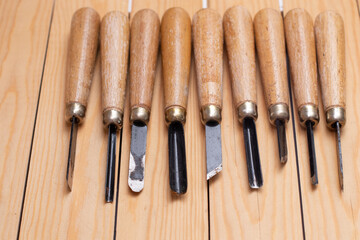 Cutter tools on wooden plank