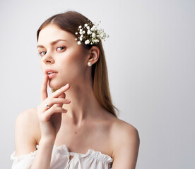 Fototapeta premium pretty woman bright makeup White dress light background