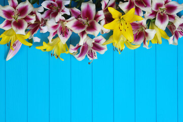  lily flowers on wooden planks