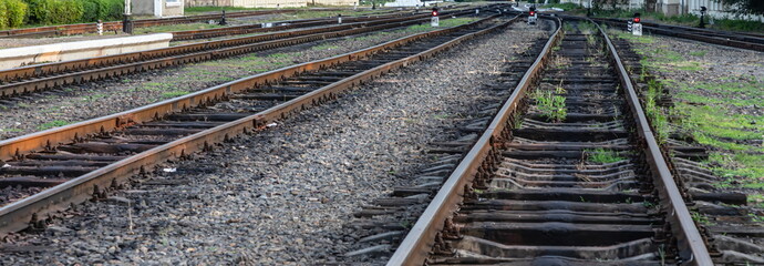 Fototapeta na wymiar Railway tracks in front of the train station