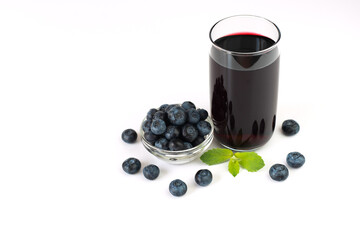 Fresh blueberry juice on a white background. ?lose-up. Copy space.