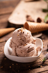 Scoops of Chocolate and Vanilla Ice Cream on Plate