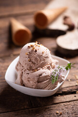 Scoops of Chocolate and Vanilla Ice Cream on Plate