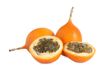 Whole and cut delicious ripe granadillas on white background