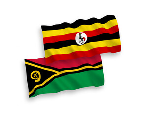National vector fabric wave flags of Republic of Vanuatu and Uganda isolated on white background. 1 to 2 proportion.