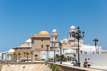 View of Cathedral Of Cadiz. Panoramic view of the city with promenade area and Mediterranean sea. Touristic travel destination in South of Spain.  © alexemarcel