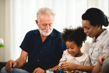 big family group with children and parent many generation meeting at home. mother father and senior...
