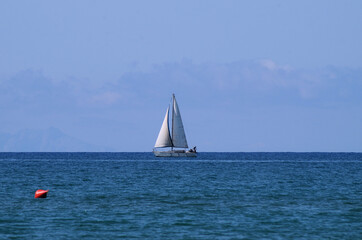 .sail boat view from beach