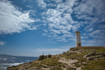 Fototapeta na wymiar Vista angular del faro de Roncudo, costa de la muerte, Galicia, España. provincia de A Coruña.