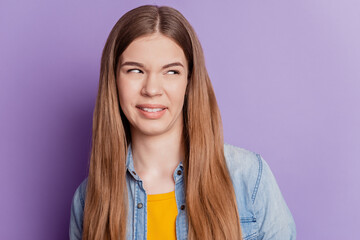 Photo of disgusted lady grimace look empty space on violet background