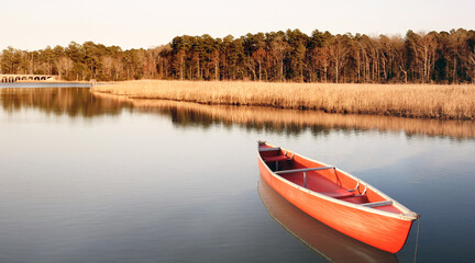 View of Kayak or canoe on a water front in the lake. Outdoors and adventure concept. vintage style. 