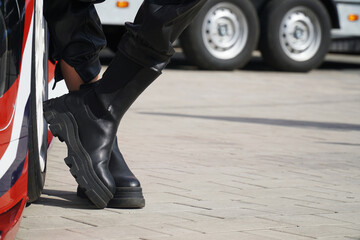 Fototapeta premium biker leg in a boot