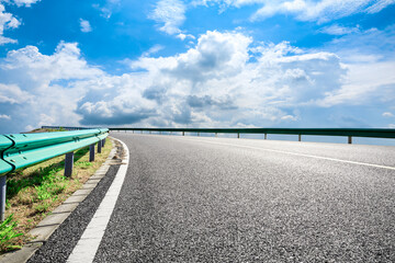 Empty and clean asphalt road and sky landscape in summer, Asia