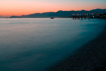 Sunset on Beach with Dramatic Sky and Beautiful Scenery, long exposure