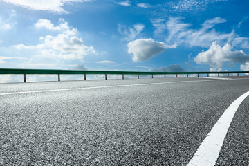 Empty and clean asphalt road and sky landscape in summer, Asia