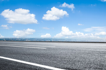 Empty and clean asphalt road and skyline view in summer, Asia