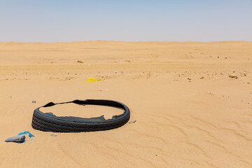 abandoned old tire in the vast desert in marib, yemen